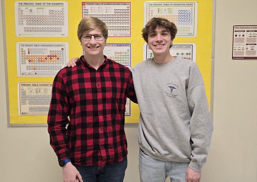 Two Canisius students standing next to each other.