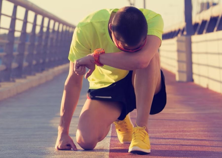 Photo of young man suffering from overtraining syndrome 