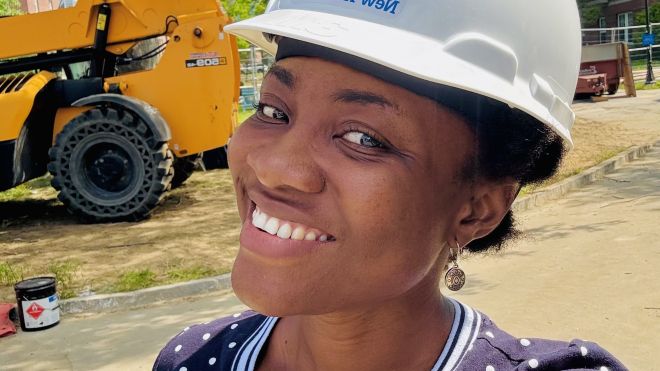 Onyeka Osuji ’27 wearing a hard hat