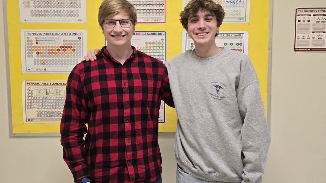 Two Canisius students standing next to each other.