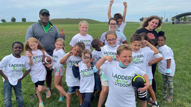 KeJuan Harmon with students at Buffalo Harbor. 