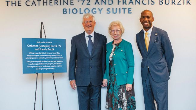 President Stoute stands with Cathy and Frank Burzik, at the dedication of the new Biology Suite in Science Hall 