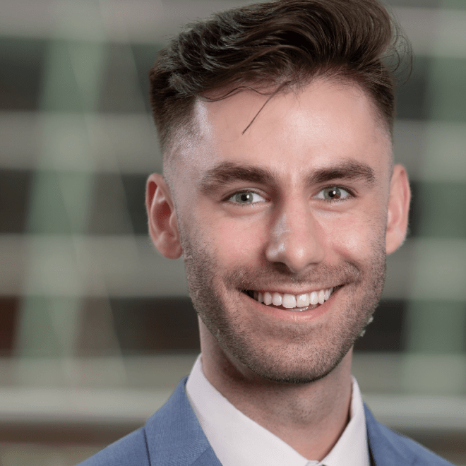 Student in suit and tie headshot, feeling of professional and polished