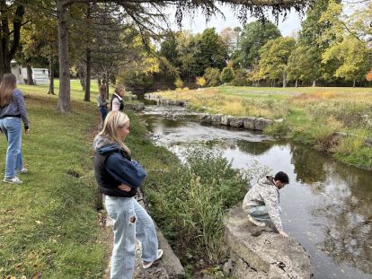 Students help clean up the creek in Forest Lawn