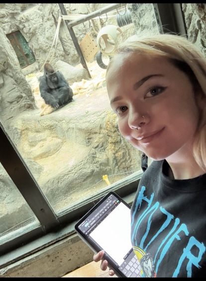 Chloe Wolfe ’27 observes gorillas at the Buffalo Zoo.