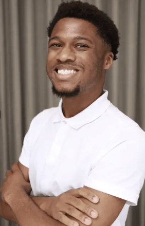 college graduate Student posing for a headshot and testimonial