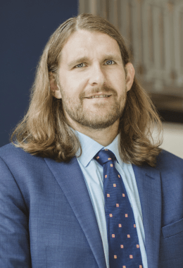 Economics, finance professor Zach McGurk