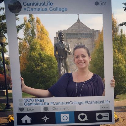 Woman holding a social media frame.